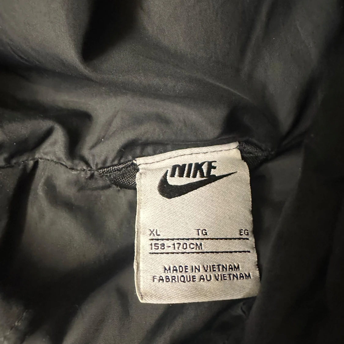 Svart dunjacka från Nike - 2