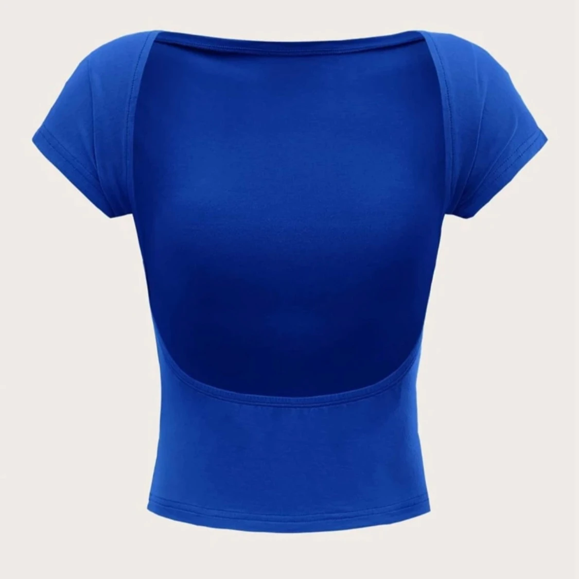 Blå topp med öppen rygg