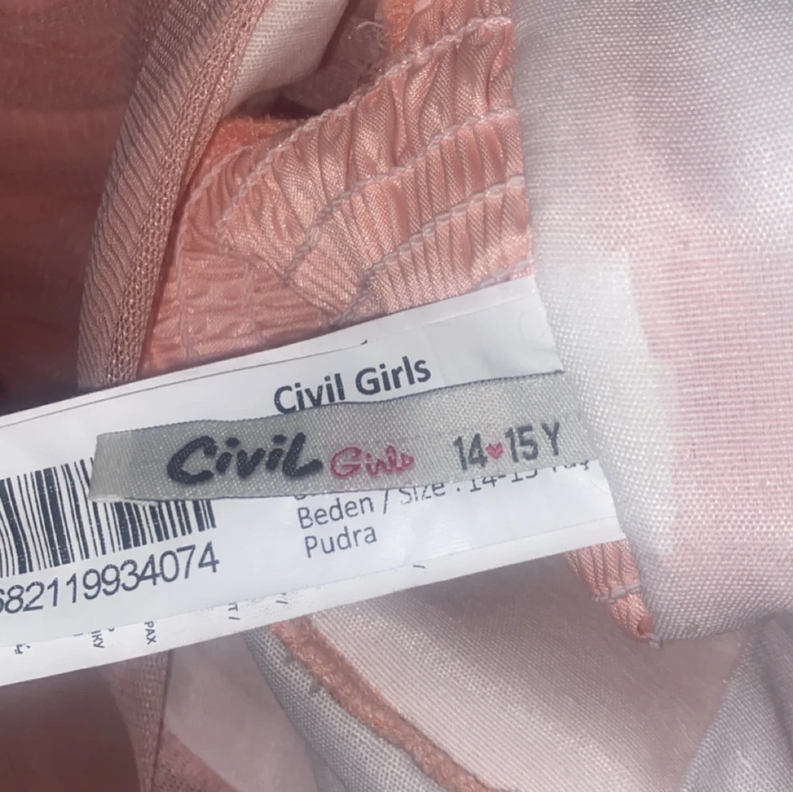 Persikofärgad klänning från Civil Girls - 2