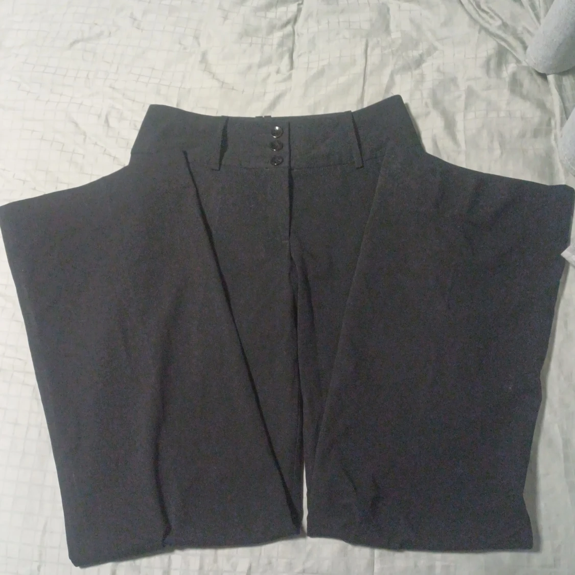 Svarta kostymbyxor