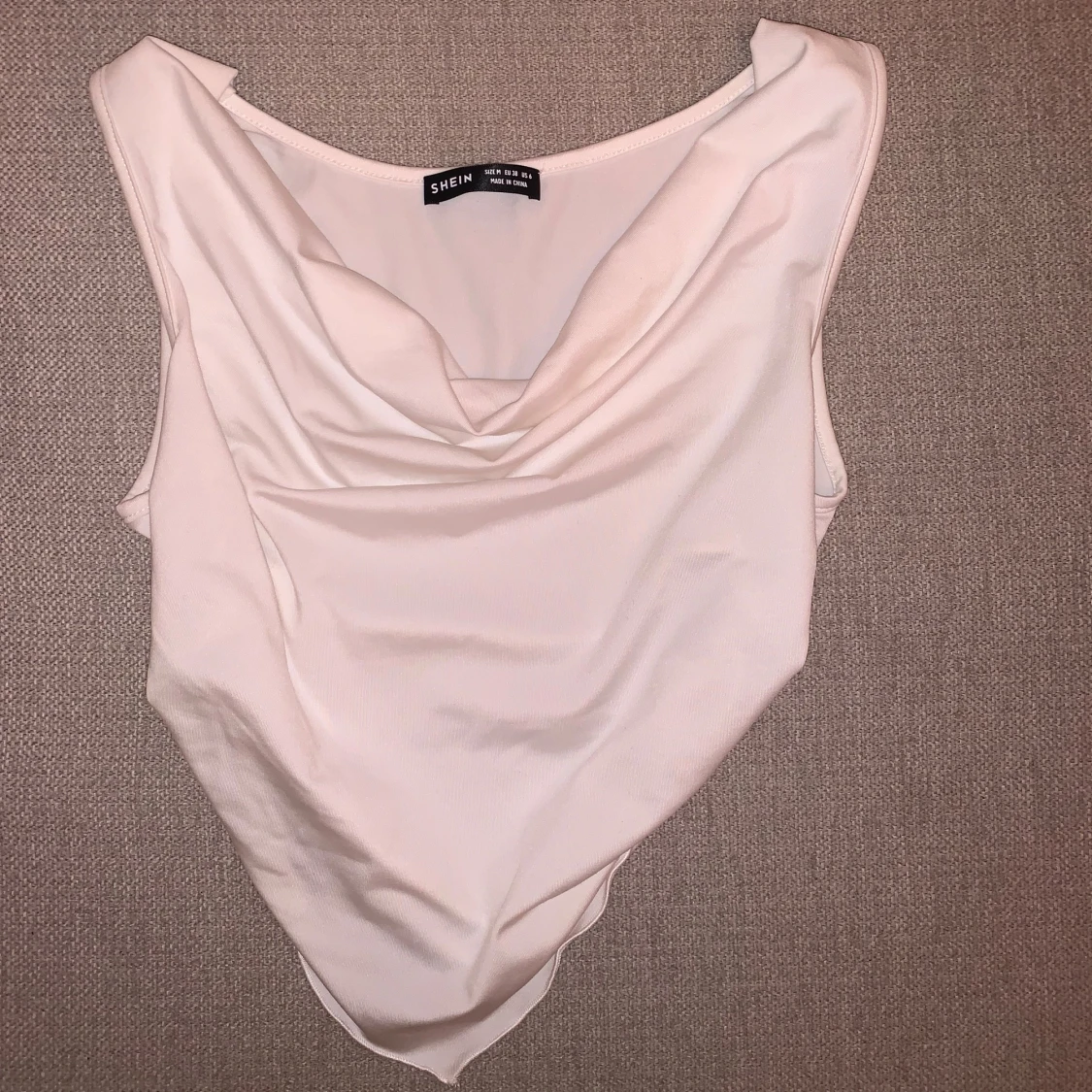 Vit ärmlös topp från Svea