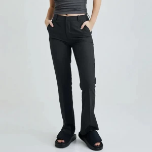 Svarta kostymbyxor - Ett par helt nya kostymbyxor som jag aldrig har använt