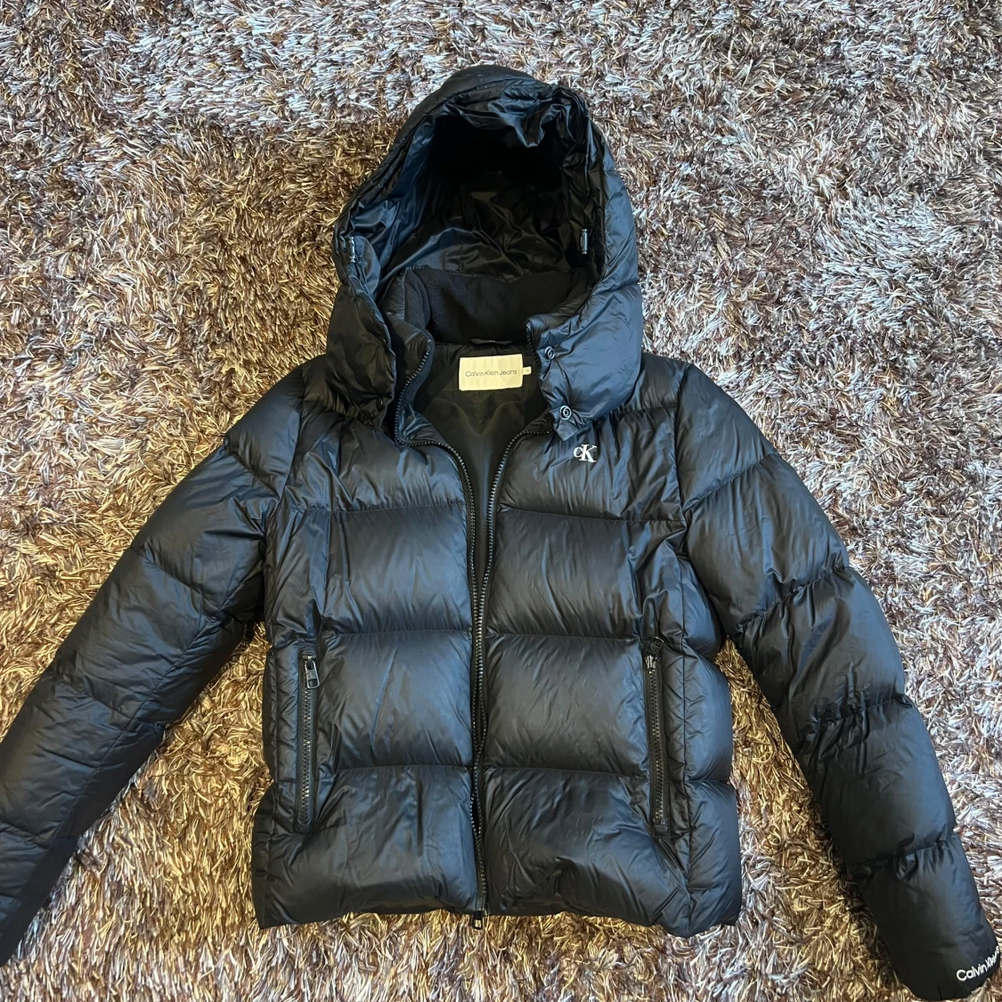 Svart pufferjacka från Calvin Klein - 90