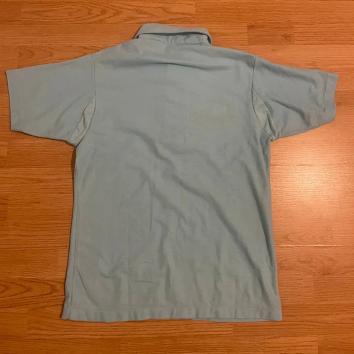 Ljusblå pikétröja  - 1