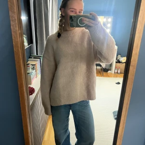 Ljusrosa stickad tröja  - Ljusrosa stickad tröja från H&M. 