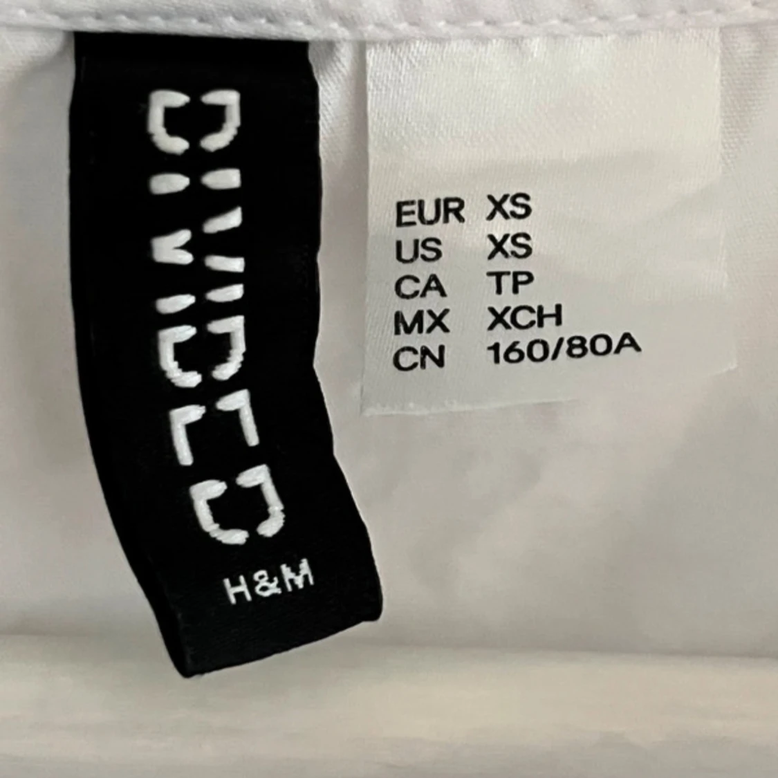 Vit blus från H&M - 90