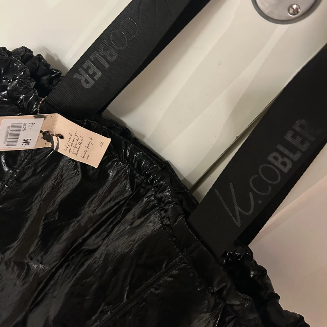 Med prislapp axelväska från K.Cobler - 2