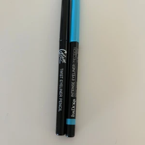 Eyeliner-pennor från glam of Sweden och IsaDora - Säljer två eyeliner pennor. En svart twist eyeliner från glam of Sweden och en blå eyeliner från IsaDora. De är aldrig använda och säljer de för 10kr styck 