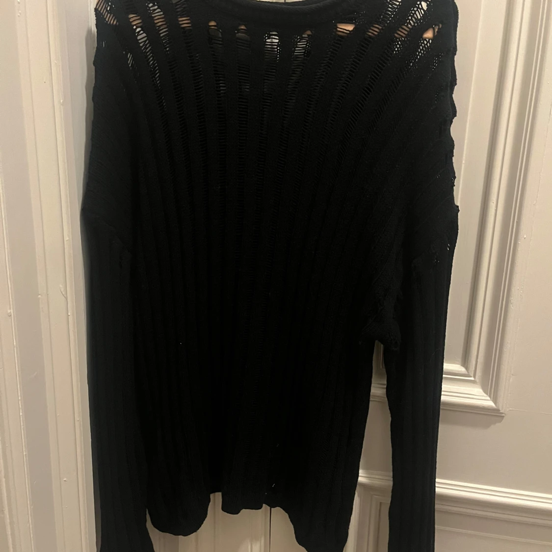 Svart stickad tröja