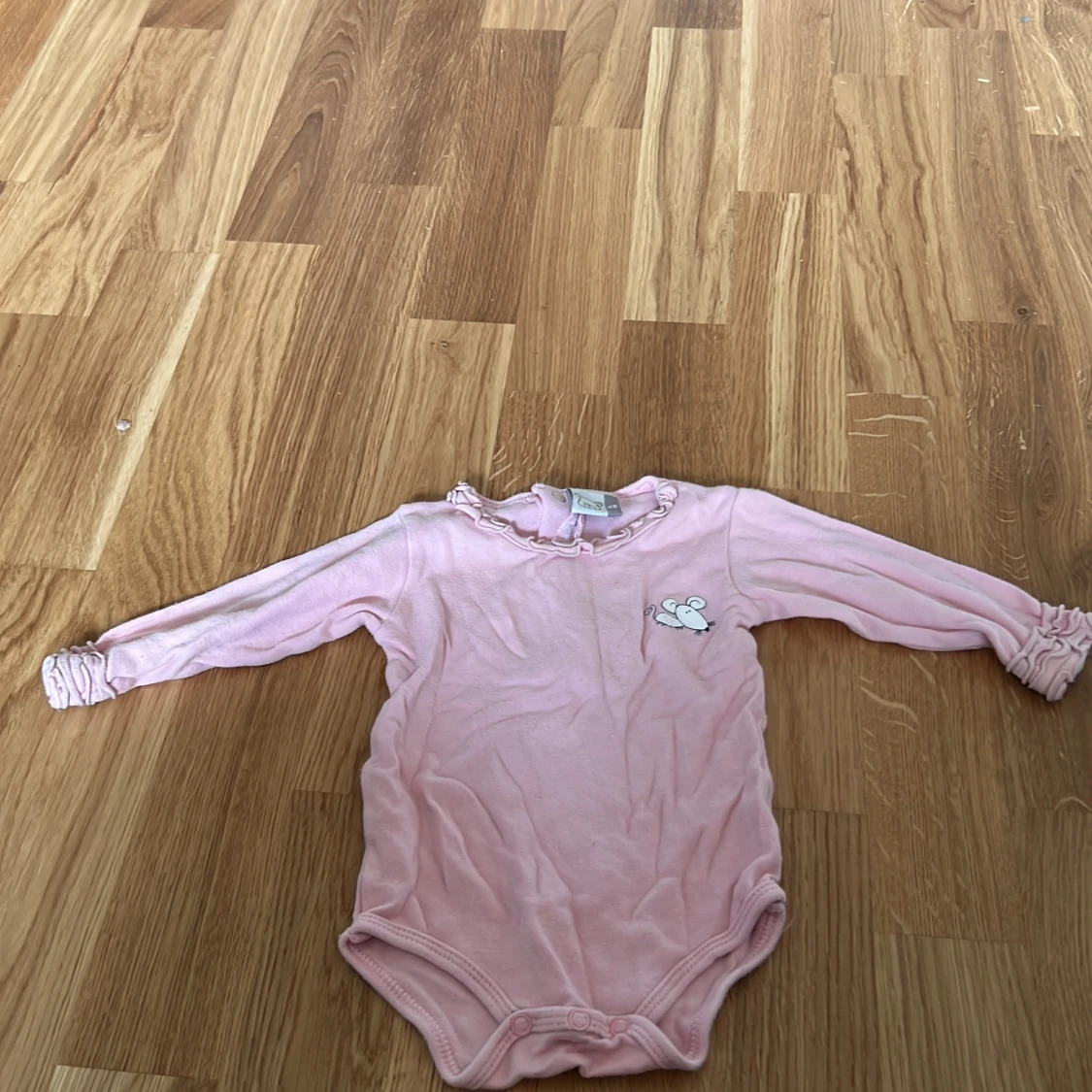 Rosa långärmad body med musmotiv