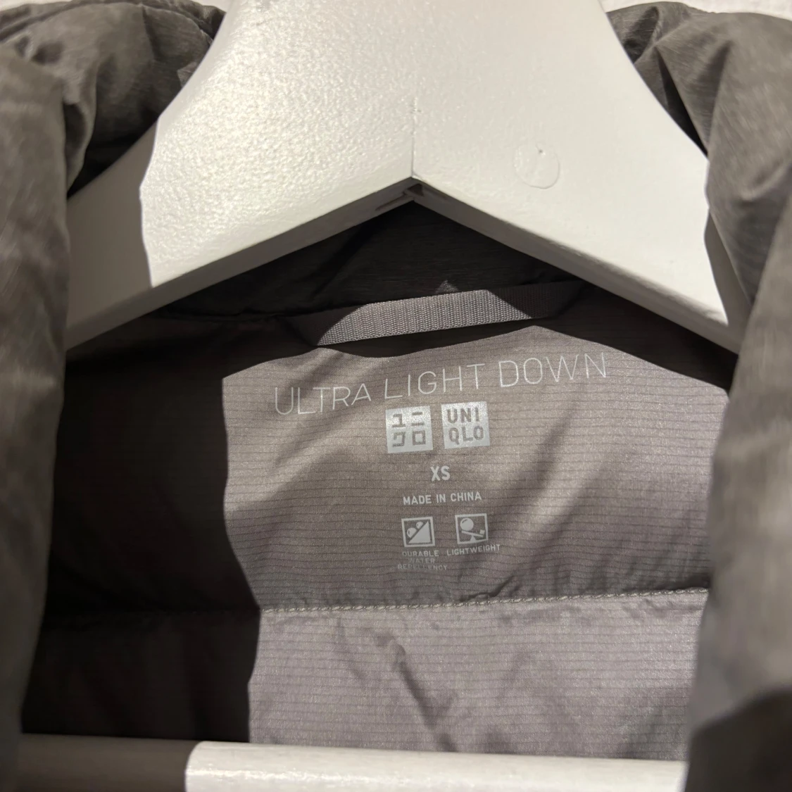 Grå dunväst Uniqlo - 91