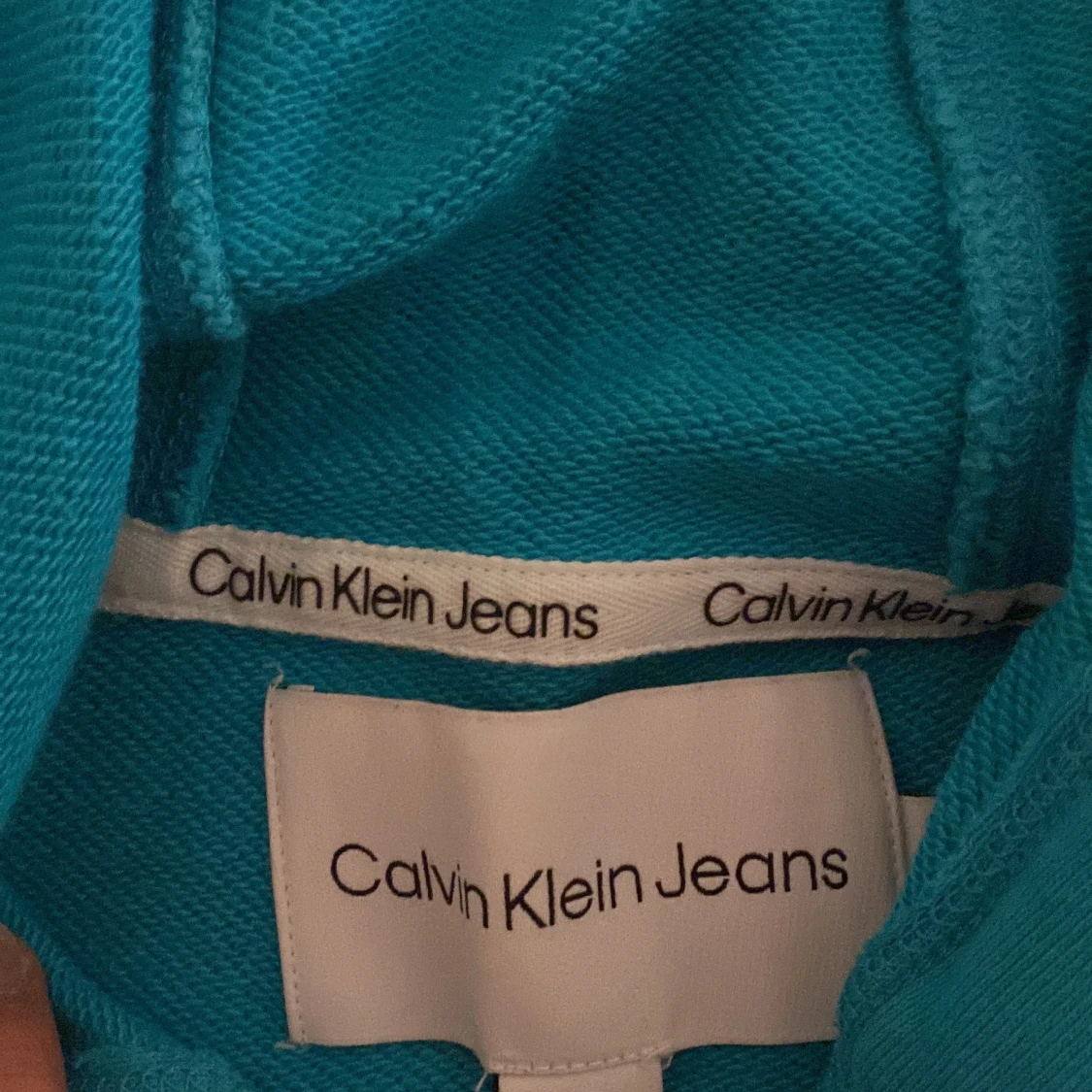 Turkos hoodie från Calvin Klein Jeans - 1