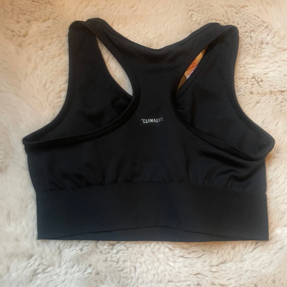 Svart sporttopp från Adidas - 1