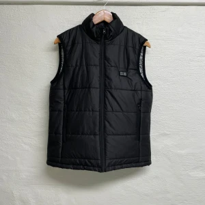 Värmeväst - Värmeväst i storlek M.