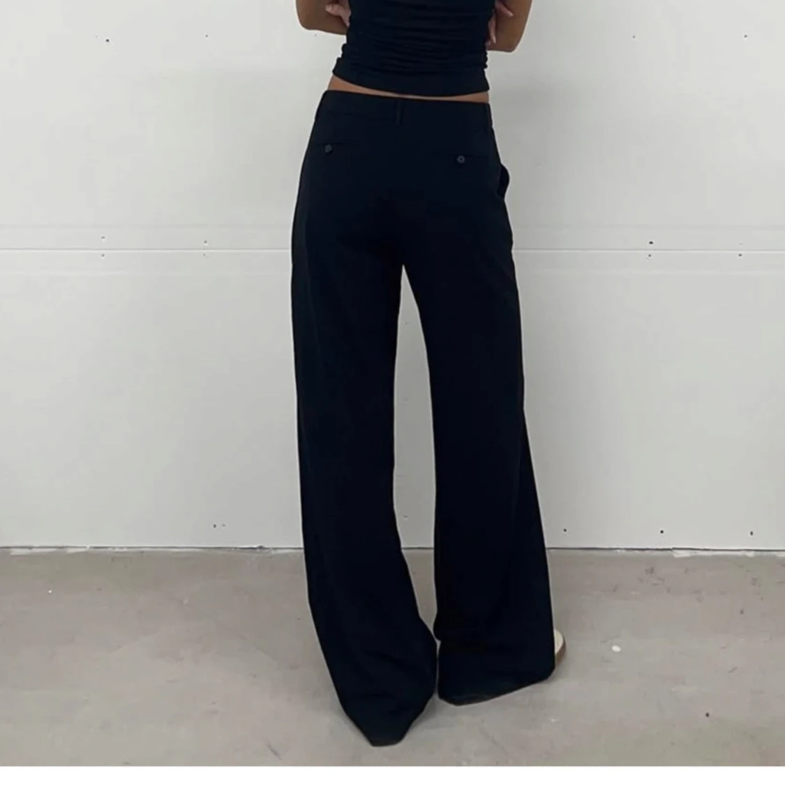 Svarta vida byxor - 91