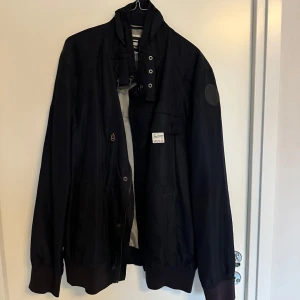 Blå sommarjacka -  Blå sommarjacka i nyskick 