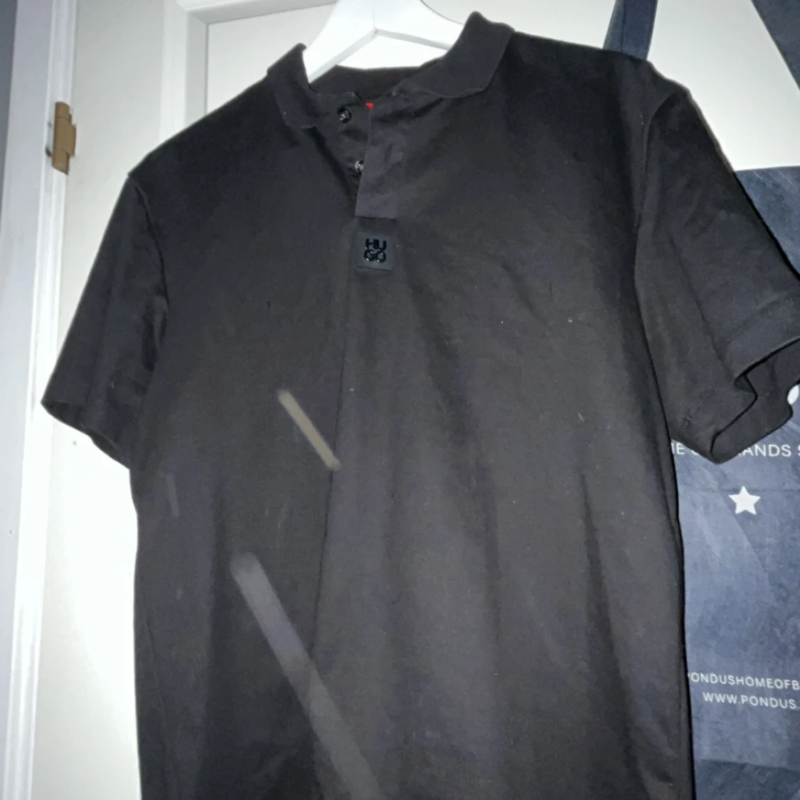 Svart kortärmad piké från Hugo - 92