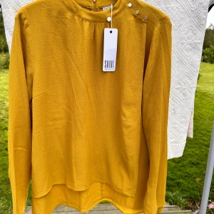 Blus - Tunn helt ny blus 