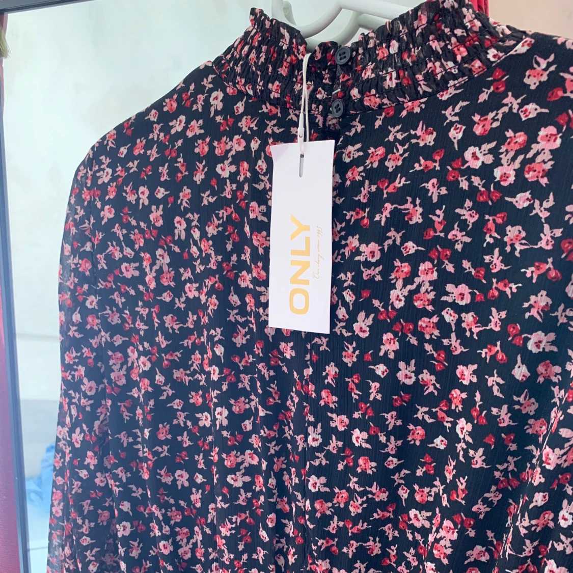 Blommig klänning - 92