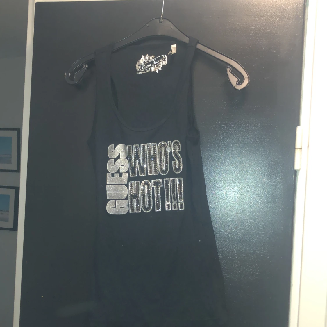 Svart linnetopp från Guess Jeans