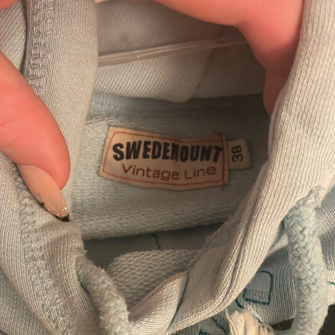 Ljusblå hoodie från Swedemount - 91