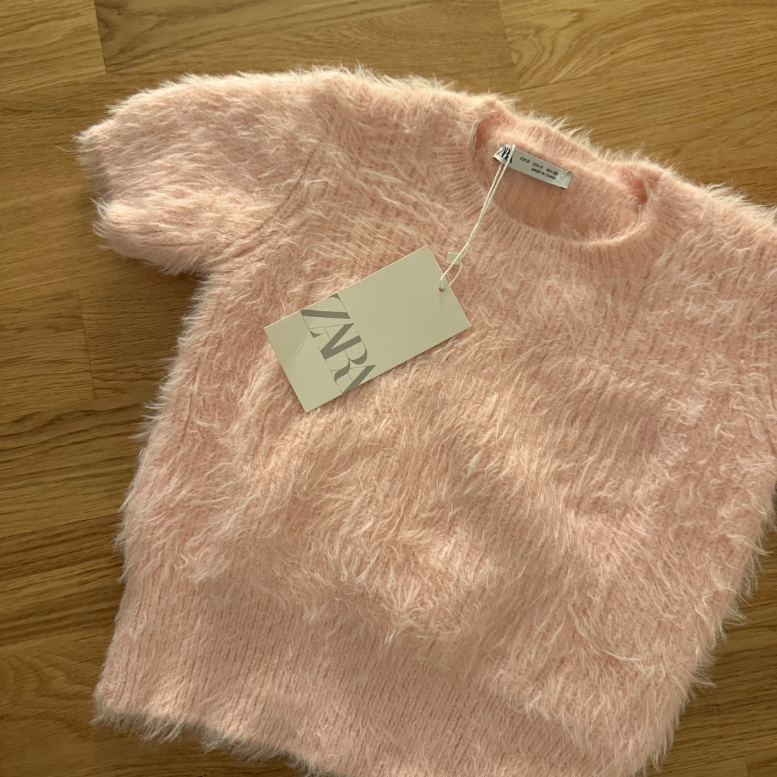 Rosa fluffig tröja från Zara