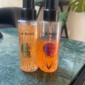 Body glow mist - Body mist med glow som doftar jätte gott. Den ena är ca 95ml och andra 55ml. 