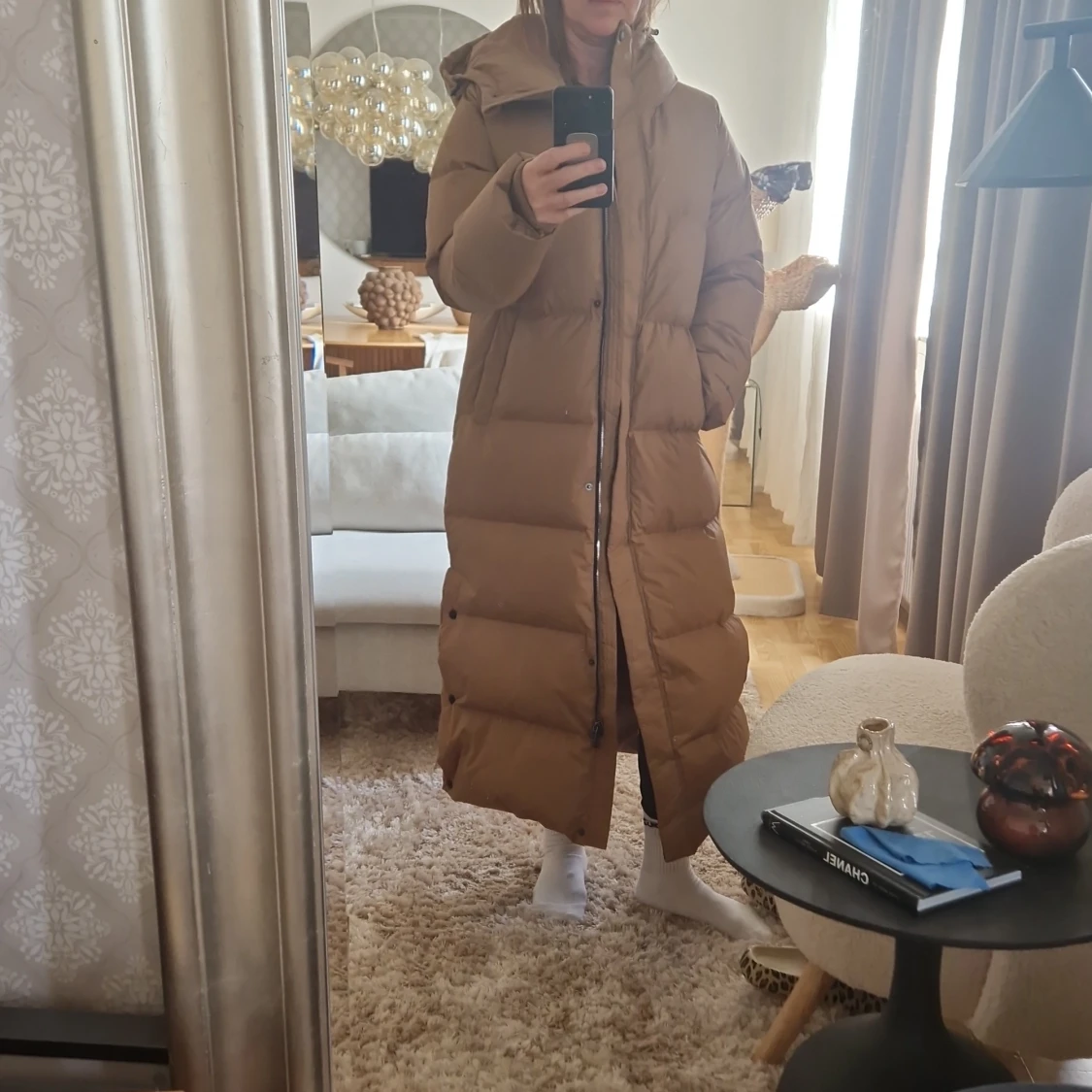 Brun lång dunjacka från Canada Snow - 92