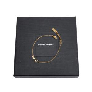 Armband från YSL (Saint laurent) i storlek small, aldrig använt. Nypris ca 4000kr. Kvitto, box osv finns!