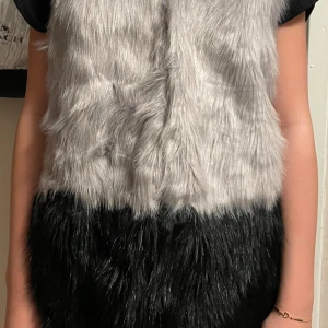 pälsväst  - fin pälsväst som är aldrig använd därför i fint skick