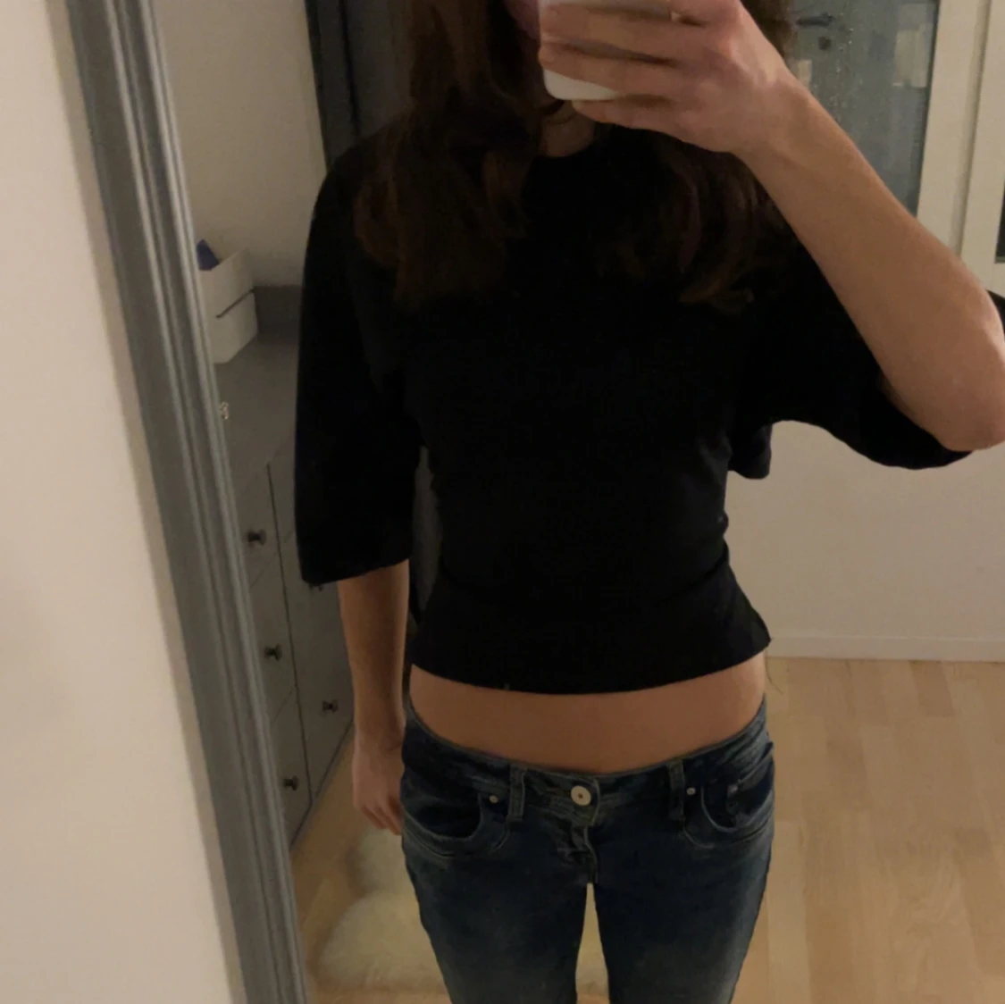 Svart croppad topp från Nelly