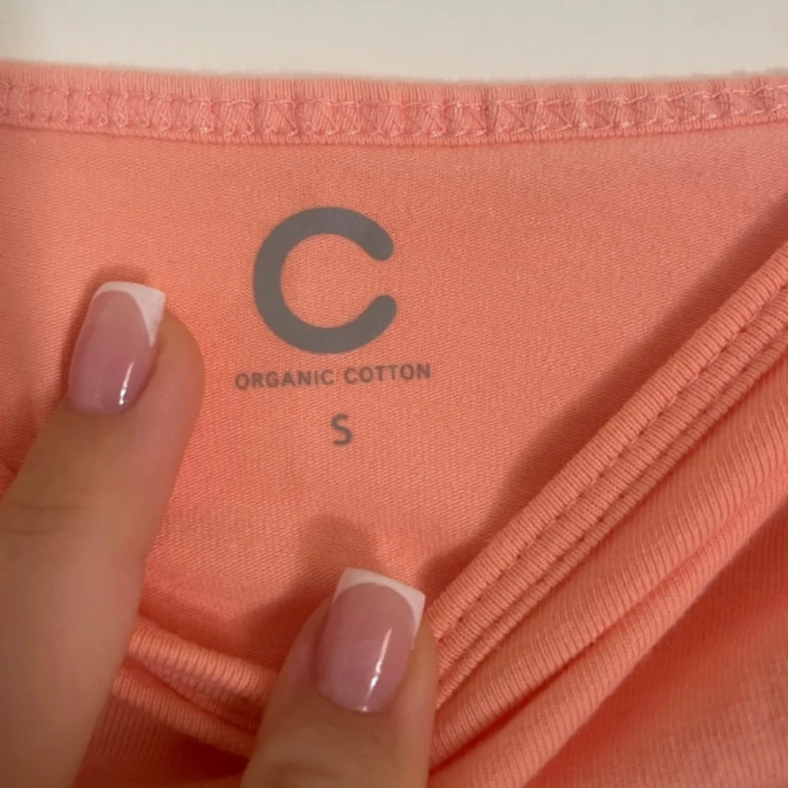 Persikofärgad linnetopp i ekologisk bomull - 90
