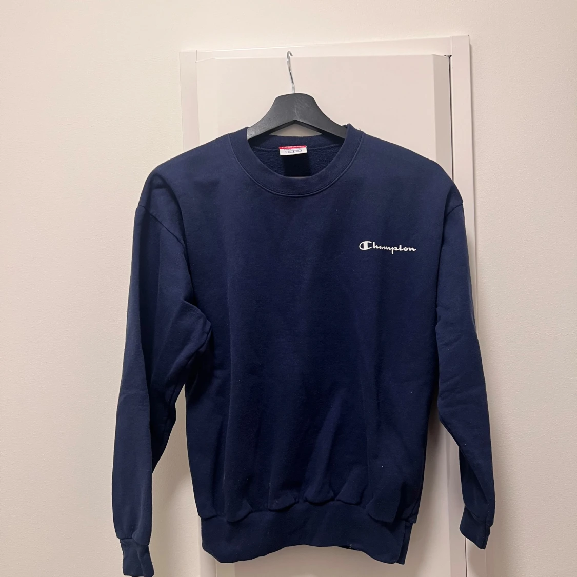 Mörkblå sweatshirt från Champion