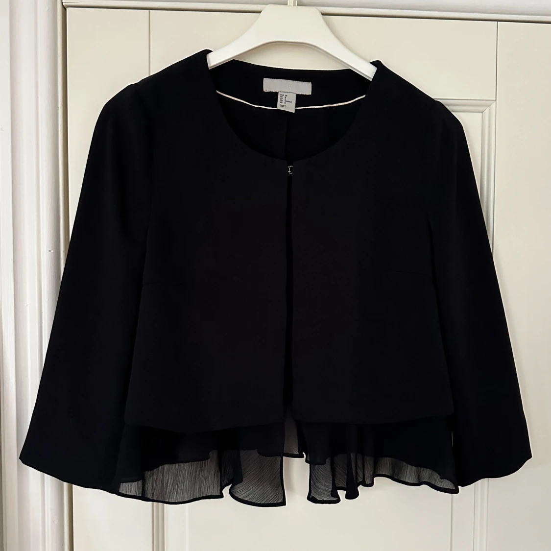 Kort blazer med detaljer