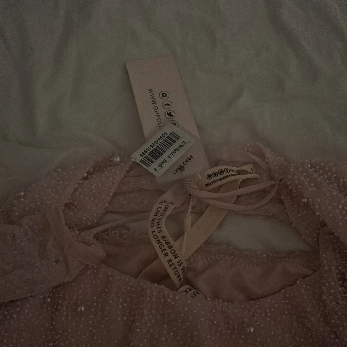 Rosa pärlbeströdd klänning - 93