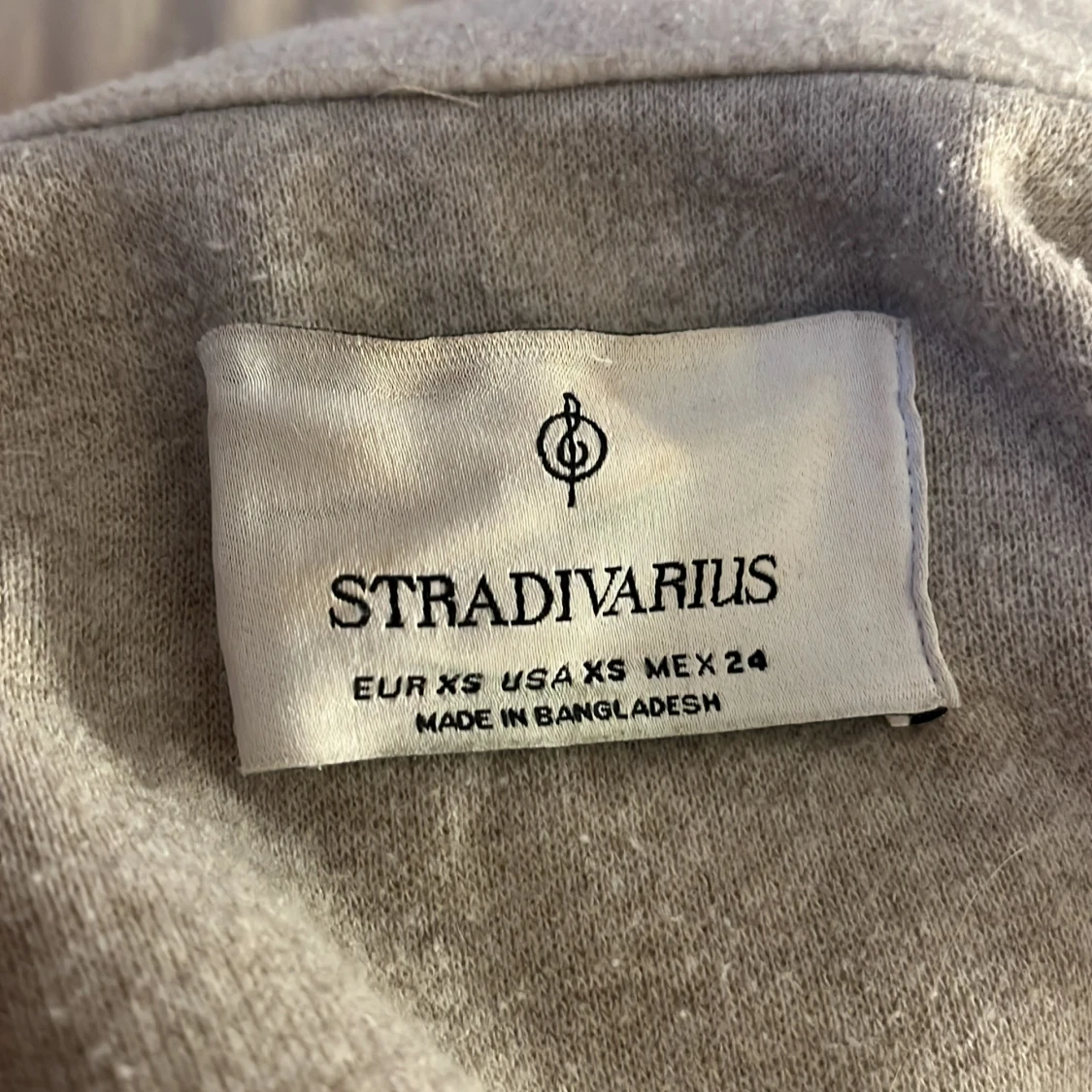 Beige kappa från strandivarius - 93