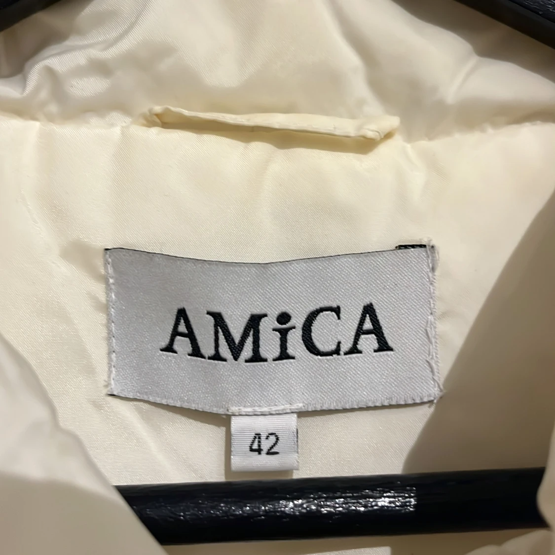 Vit quiltad dunväst från Amica - 2