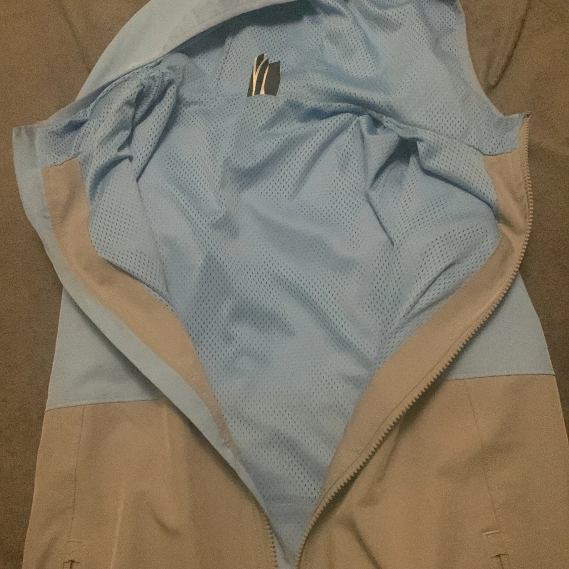 Blå och beige vindjacka från Under Armour - 1