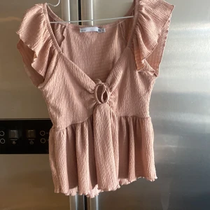 Creme rosa topp - Oanvänd topp. 