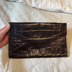 Brun clutch - Vintage, äkta läder 🤎 Aldrig använd, superfint skick. 