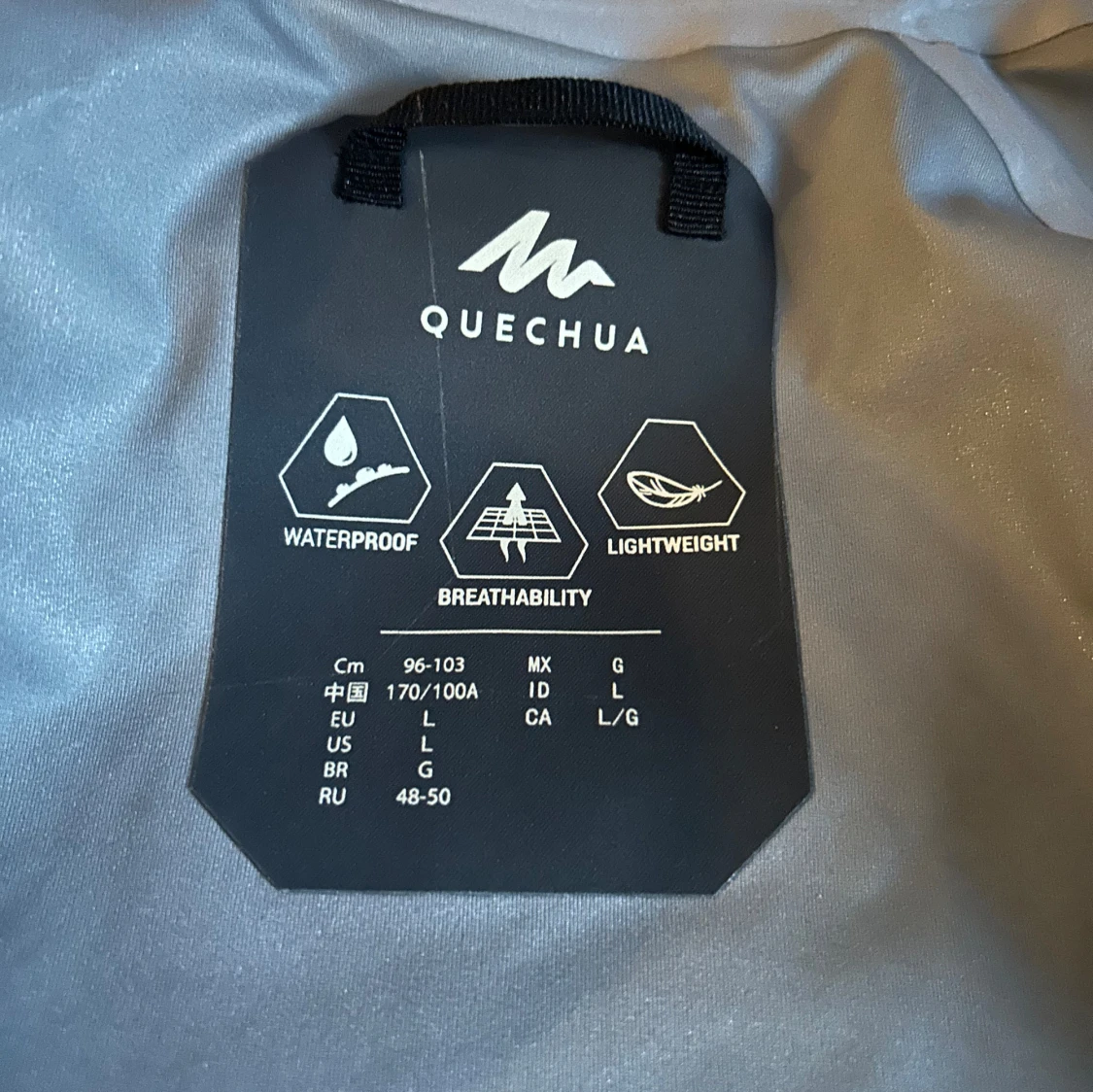 Grå och blå vindjacka från Quechua - 92