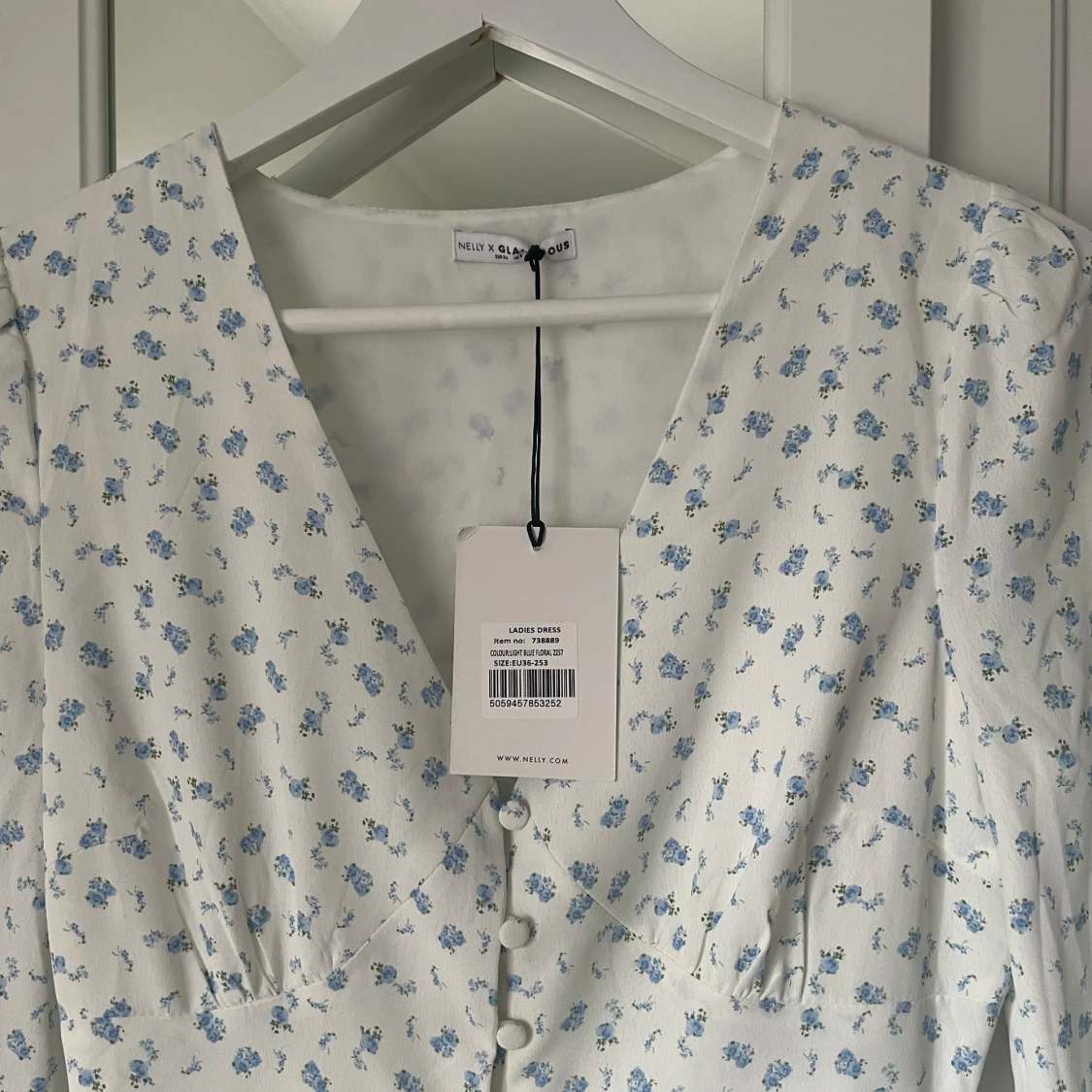 Blommig klänning - 91