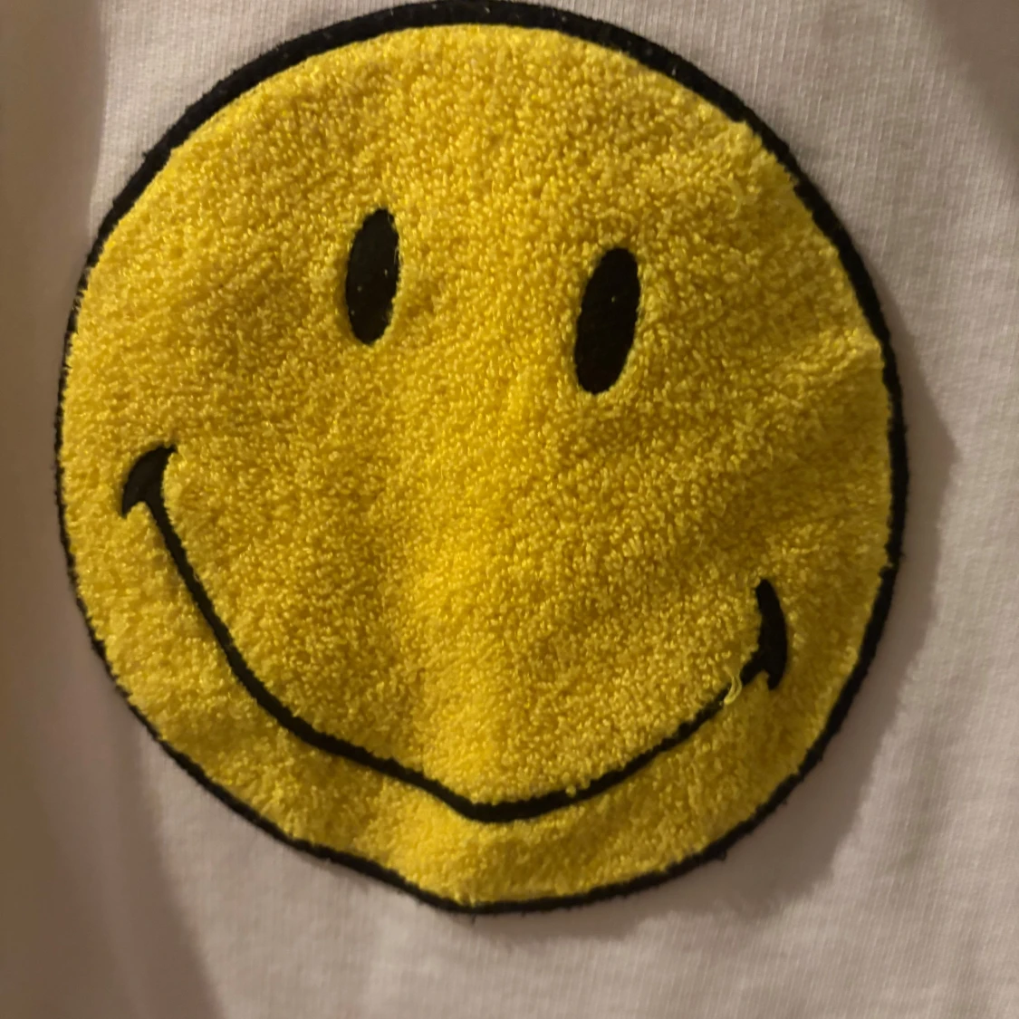 Vit hoodie från Sandro med smiley - 90