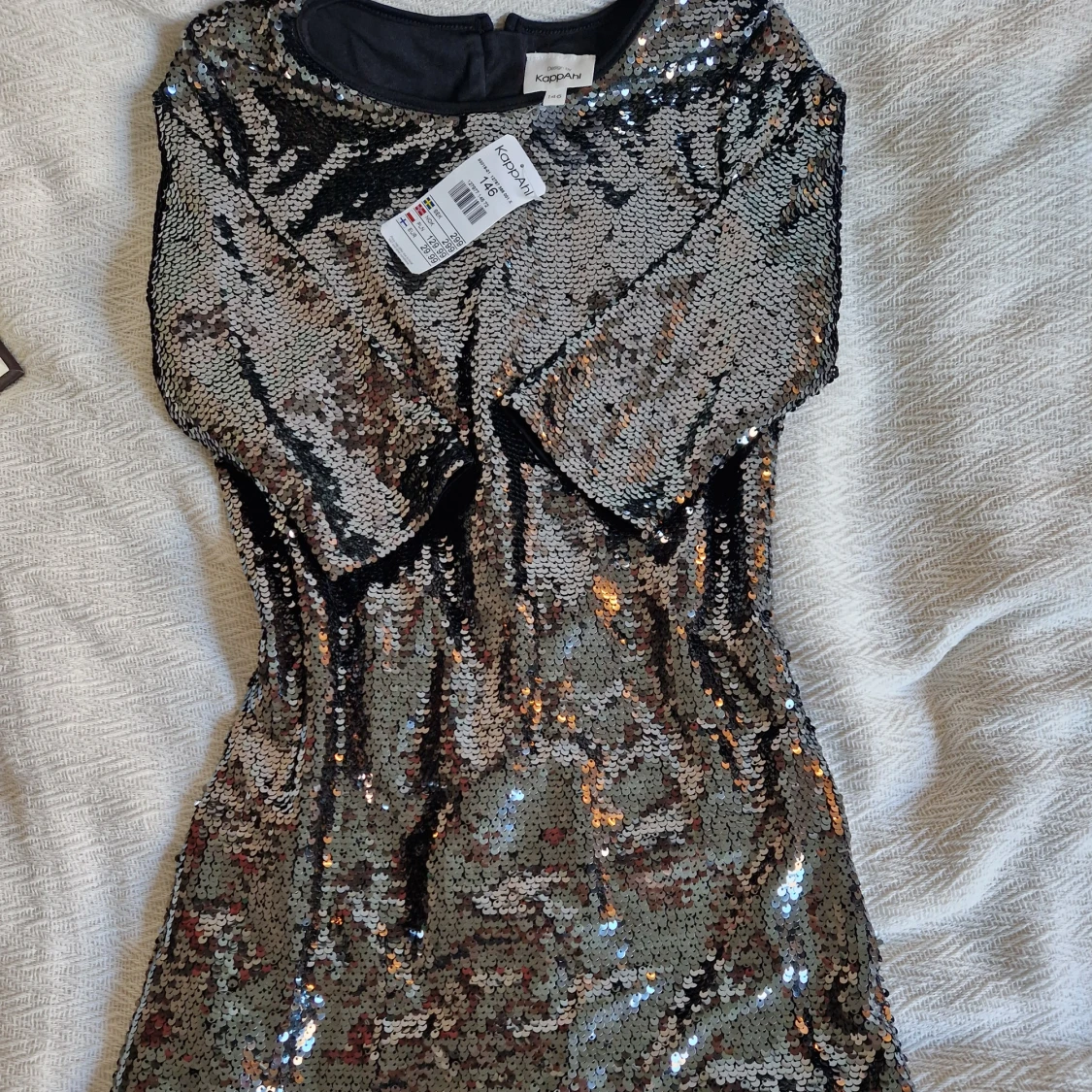 Glittrig paljettklänning 