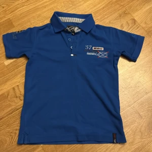 En T-shirt  - Storlek 134-140 cm 10-9 år gammal 