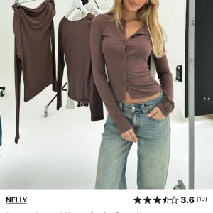 Topp - Säljer denna topp från Nelly som är helt oanvänd med prislapp på. 