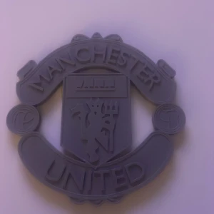 Manchester United logga - Snygg Manchester United logga i grått. 