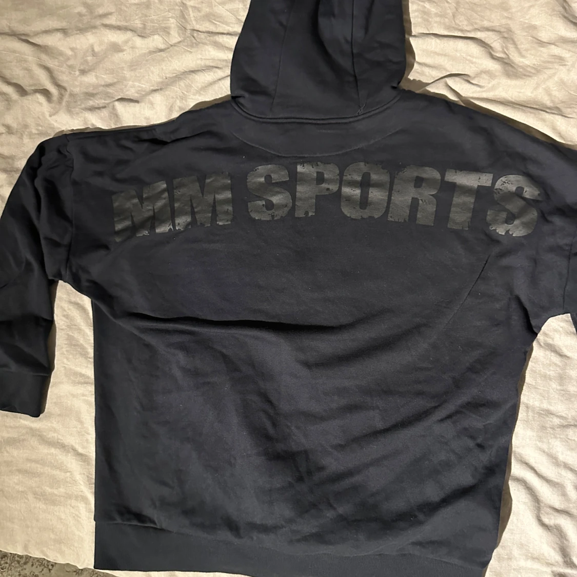 Svart hoodie från MM Sports - 91