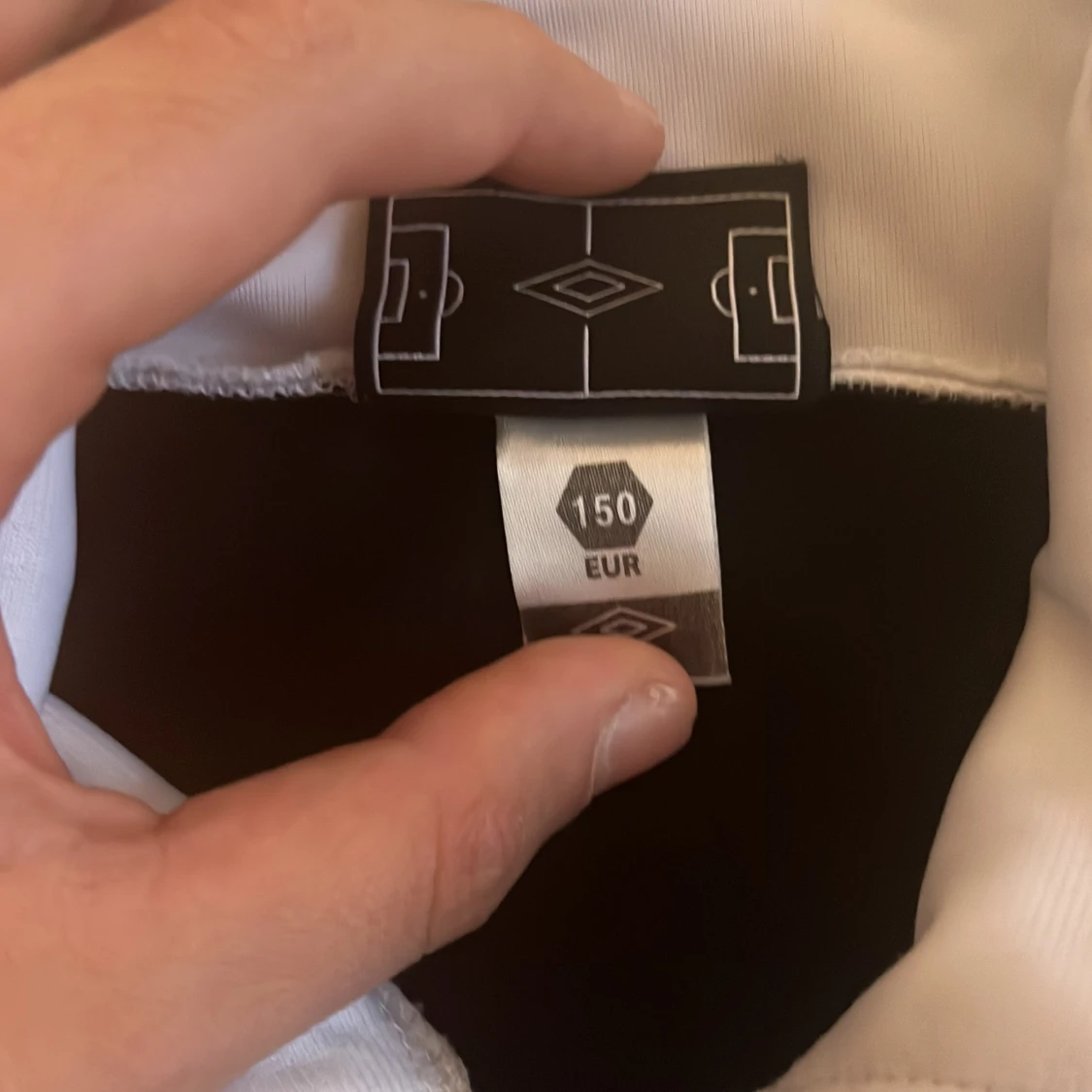 Svart och vit träningsdräkt från Umbro - 92