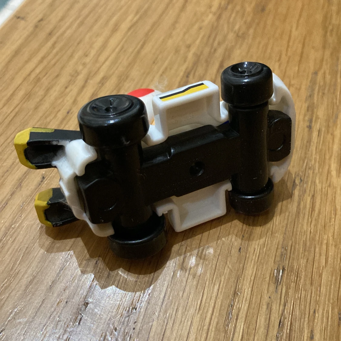 Vit och blå leksaksbil med figur - 92